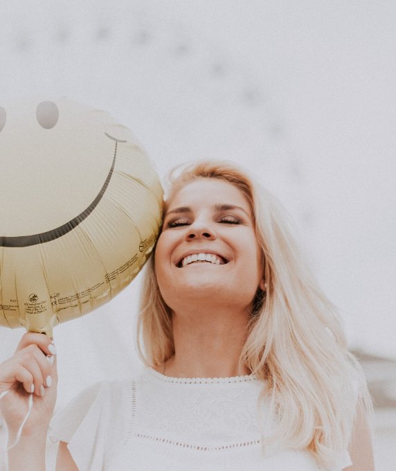 Happy patient smiling at Kind Dental